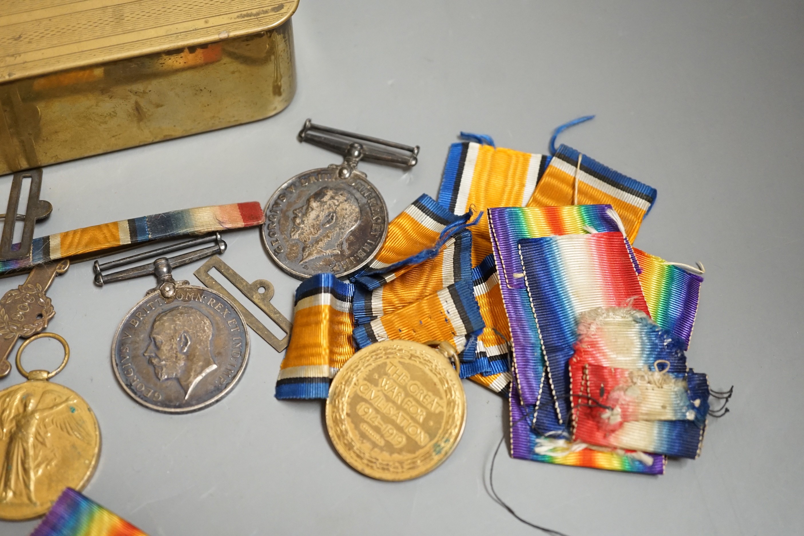 A WWI medal trio awarded to 4483 PTE. F. E. SHARP. 24 - LOND. R., an allied victory medal and matching British war medal awarded to 57292 GNR. D. KENDALL. R. A. with an honourable discharge certificate given to 5723 J. O